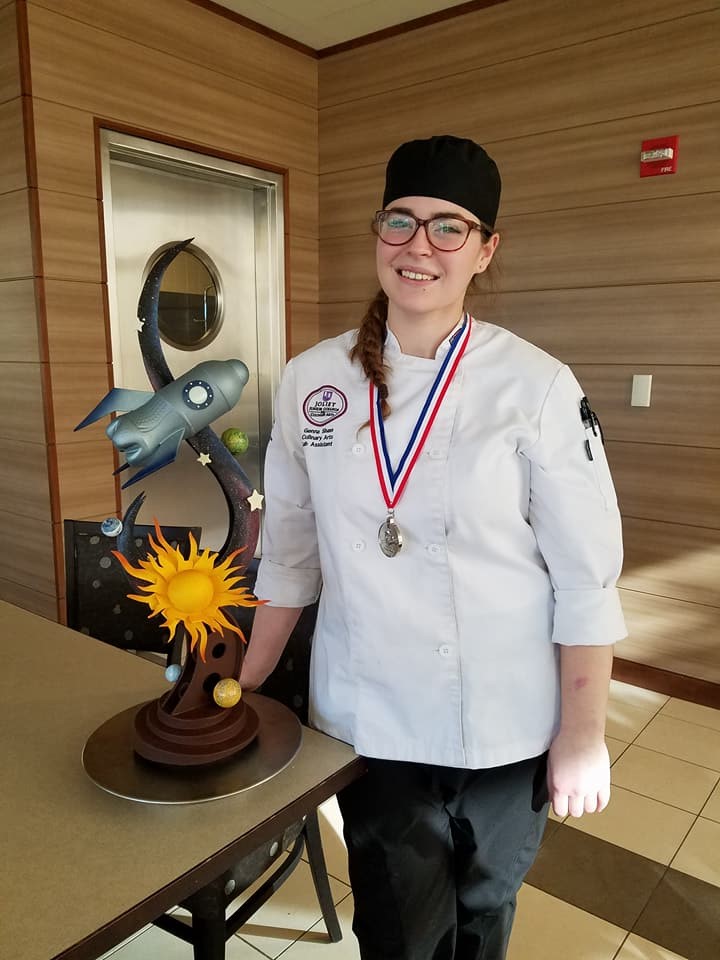 Culinary Arts Student Genna Shaw with her Chocolate Rocket Showpiece