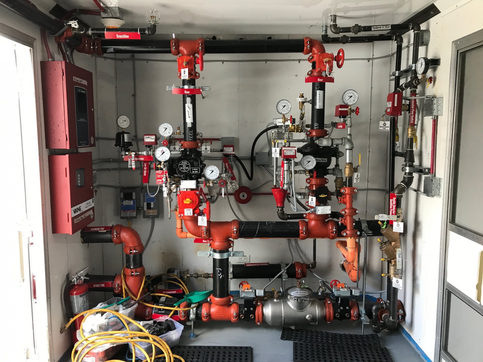 The trailer interior features many types of sprinkler systems that the students will encounter upon entering the profession. It also has a controlled burn room. 