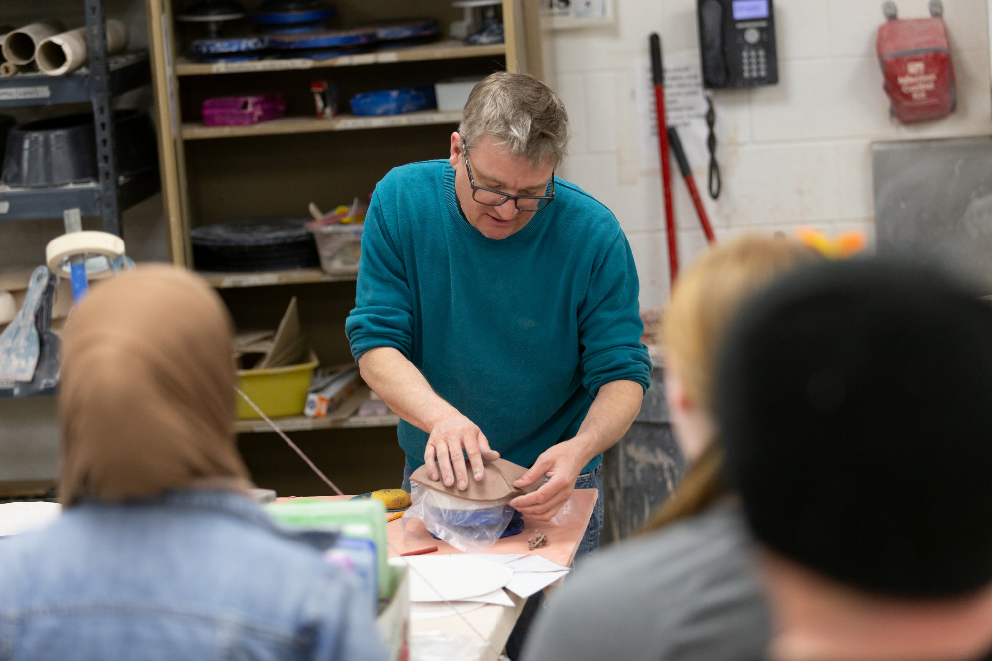 Ceramics Professor, Eric Gorder, instructing the class.