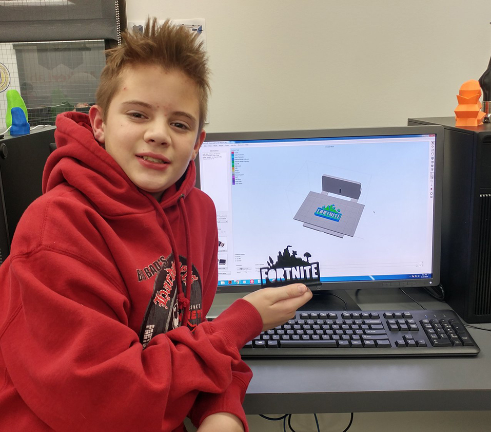 student with 3-D printed object