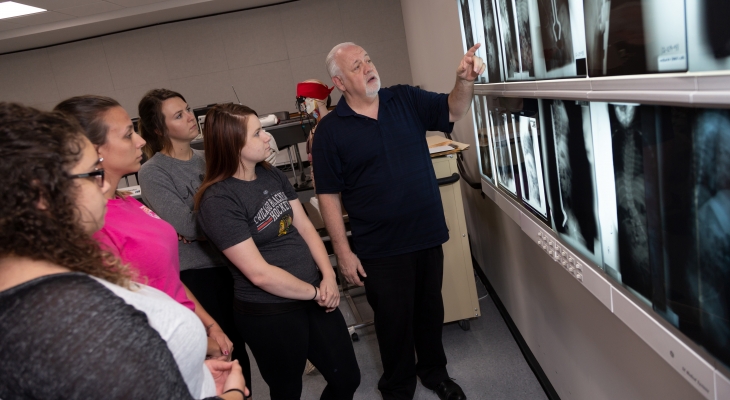 Rad Tech Instructor with x-ray